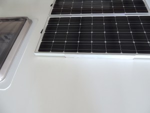 Bonded Solar Panels to Roof of Habitat