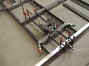 Fixturing Plate Assembly Into Rear Frame