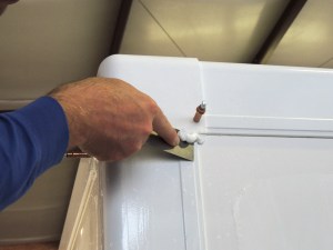 Scraping Squeeze Out on Corner Cap