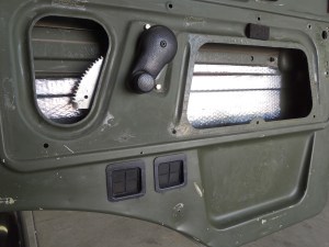 Applied Sound Deadening Mat to Interior Surfaces of Doors