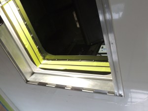 Masked and RTV Sealed Cab Side Passthrough Frame