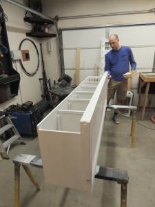 Applied first coat of paint to pantry