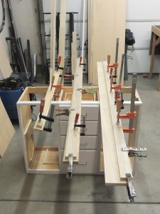 Assembled, glued, and screwed bed support rails