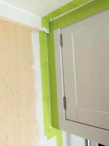 Bonded and installed upper kitchen cabinet