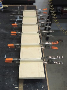 Bonded cubby mount rails to bottom cubby board