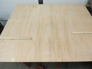 Bonded tank standoff strips to kitchen cabinet rear panel