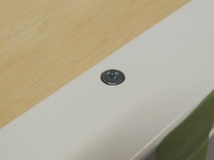 Countersunk holes in cabinet face