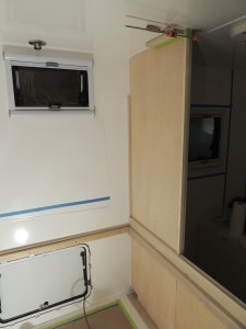 Dry fit, masked, prepped, bonded, screwed, and assembled bed wall into habitat