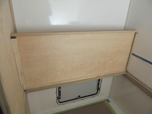 Fit checked headboard and cubby components in habitat