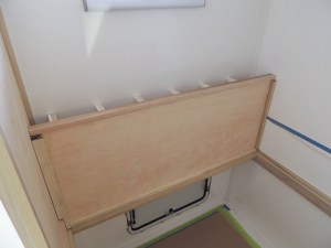Fit checked headboard assembly in habitat