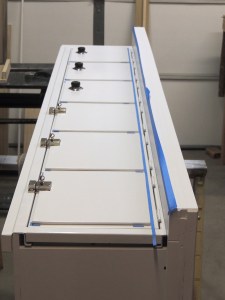 Installed locks on upper 3 pantry doors and latches on lower 3 pantry doors