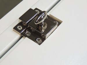 Installed locks on upper 3 pantry doors and latches on lower 3 pantry doors