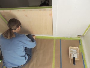 Masked and applied first coat of paint to forward side of driver side bed wall