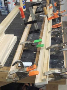 Started bonding lumber for passenger side upper cabinet