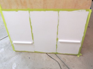 Started painting base board and back of lower kitchen cabinet