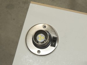 Cut entry light hole in shower area divider