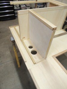 Drilled holes in shower area divider for shower fixture