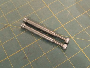 Fabricated ground mounting plug hardware