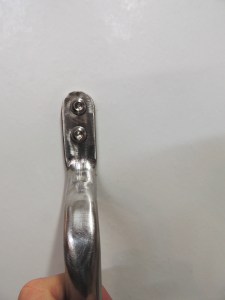 Fabricated spreader plate for internal grab handle mount