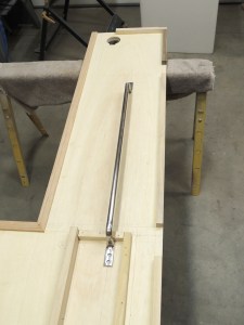 Planned entry grab handle location on shower area divider