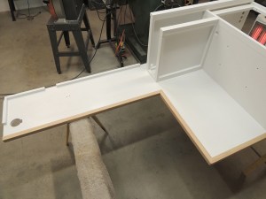 Prepped and applied first coat of paint to calorifier cabinet assembly