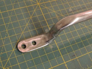 Rounded corners of interior grab handle