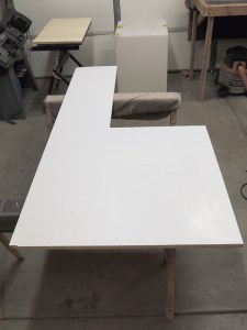 Trimmed FRP panel to edge of shower area divider