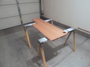 Applied first 2 coats of urethane to passenger side table