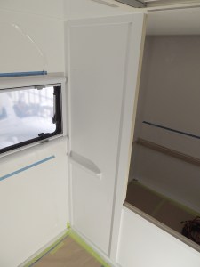 Applied first coat of paint to forward passenger side bed wall