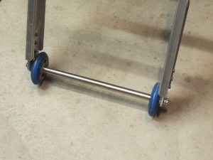 Fabricated and installed wheels to allow ladder to move with sway of truck