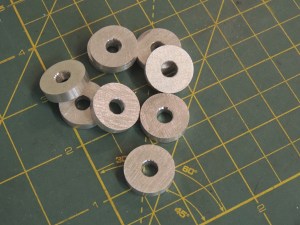 Fabricated spacer washers for ladder upper bracket
