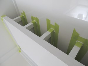 Fit checked, masked, prepped, bonded, and screwed headboard-cubby assembly