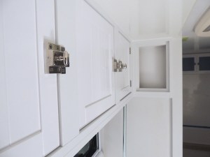 Fit checked, prepped, bonded, and screwed passenger overhead cabinet