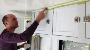 Fit checked, prepped, bonded, and screwed passenger overhead cabinet