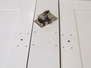 Installed latches on passenger side overhead cabinet