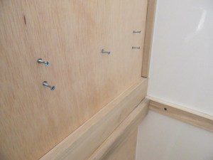 Installed passenger side bed wall table mount