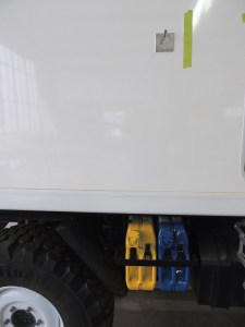 Located awning on exterior of truck and drilled awning mount holes