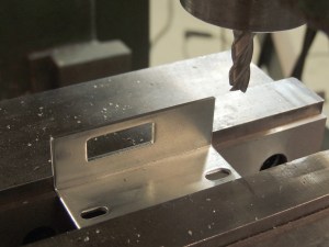 Milled down combination lock strike plates