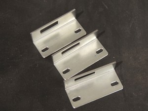 Milled down combination lock strike plates