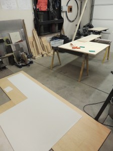 Prepped and bonded FRP panel to shower area divider using 2 part urethane