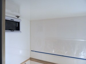 Prepped, bonded, and screwed rear over bed cabinets into habitat