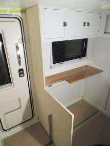 Test fit shower area divider with passenger side table