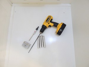 Drilled shower drain holes in floor