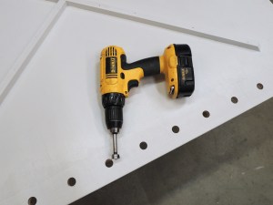 Drilled vent holes in driver side bed deck