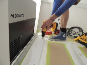 Installed refrigerator and slide in habitat