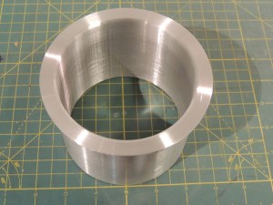 Machined aluminum sleeve to finish heater passthrough hole