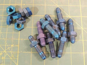Machined AN-4 bulkhead fittings into tank barb fittings