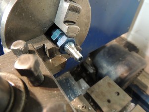 Machined AN-4 bulkhead fittings into tank barb fittings