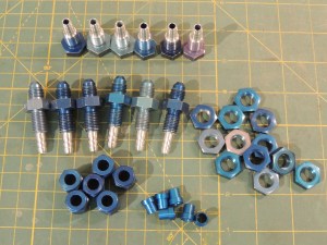 Machined AN-4 bulkhead fittings into tank barb fittings