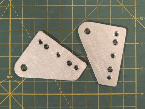 Machined refrigerator and fill pump electrical socket mounts